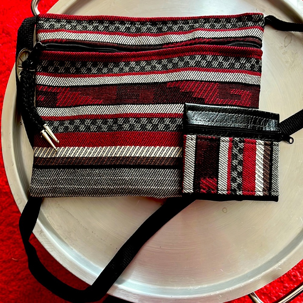 Brand new used in perfect condition paired with matching wallet!